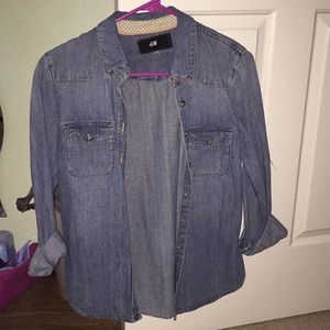 A blue jeans flannel, in size Medium, from H&M.